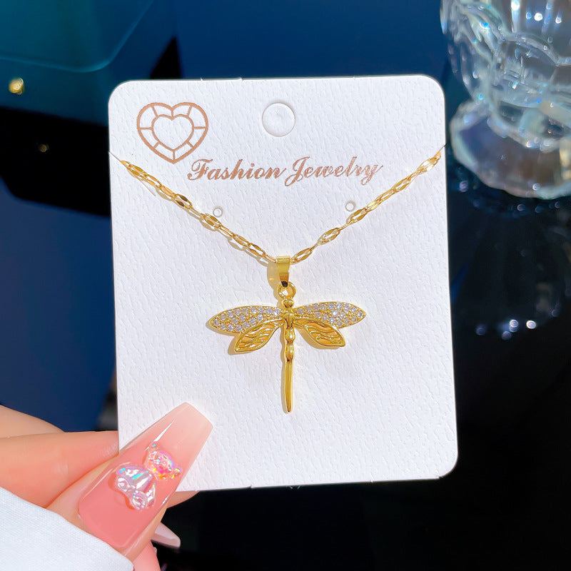 Gold necklace with dragonfly inlay